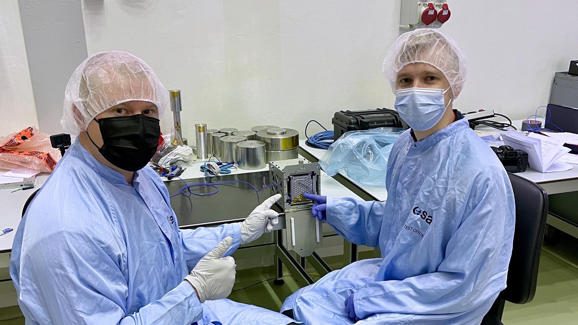 Kevin and Samuli with the satellite in a test pod